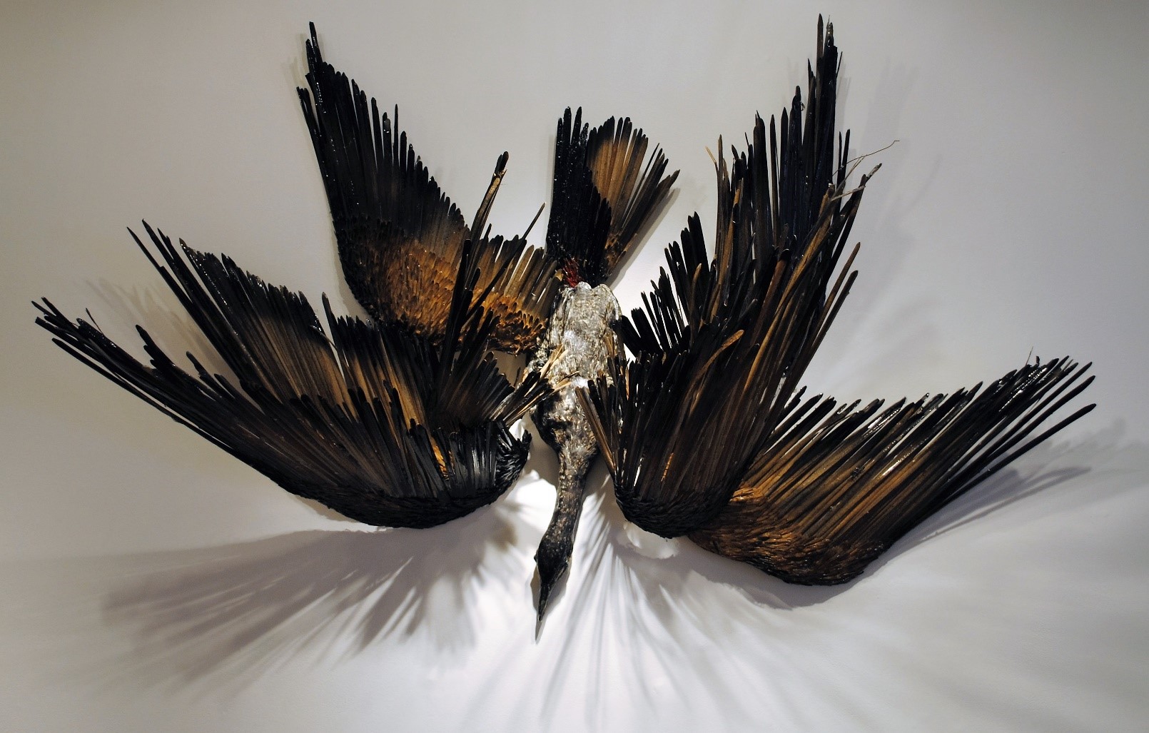Cormorant Weather, 2016, Porcelain, cattails, tree seed pods, 2-part epoxy resin, wood, 150 x 150 x 65cm